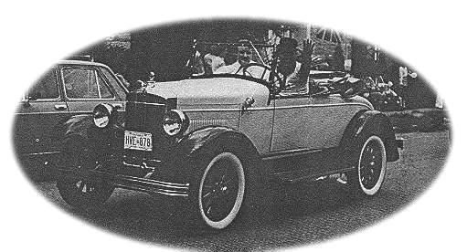 Ed driving his 1928 Durant M-2 roadster in a local parade